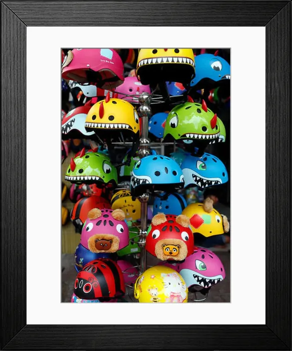 Framed Print : Shop for Kids Bike Helmets. Ho Chi Minh City. Vietnam Framed Print : Shop for Kids Bike Helmets. Ho Chi Minh City. Vietnam