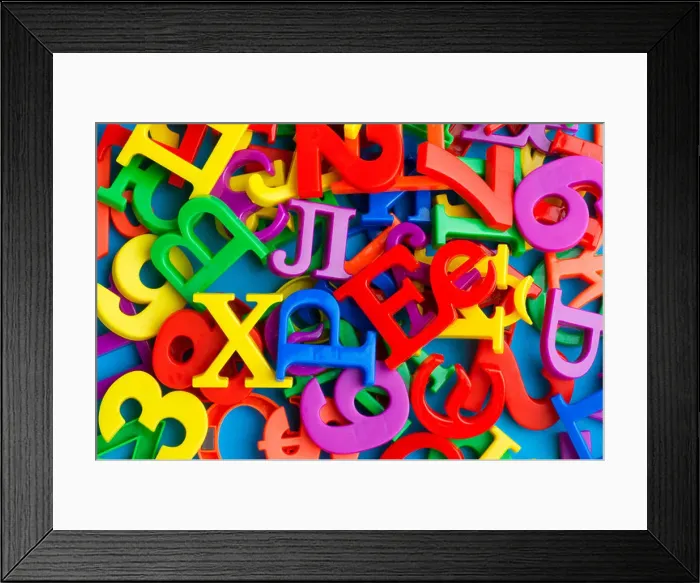 Framed Print : object on blue - toy plastic letters and numbers Framed Print : object on blue - toy plastic letters and numbers