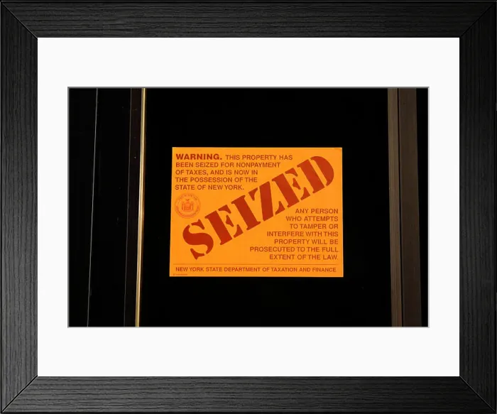Framed Print : A New York State Department of Taxation and Finance Seized sticker for the nonpayment of taxes (tax lien) Framed Print : A New York State Department of Taxation and Finance Seized sticker for the nonpayment of taxes (tax lien)