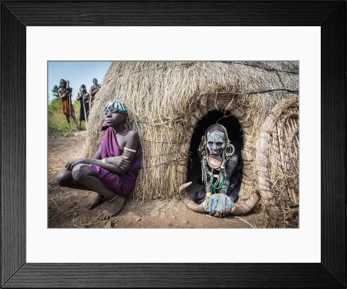 Framed Print : JINKA, ETHIOPIA, - 19 AUGUST 2015:unidentified women from Mursi tribe with big lip Plate Framed Print : JINKA, ETHIOPIA, - 19 AUGUST 2015:unidentified women from Mursi tribe with big lip Plate