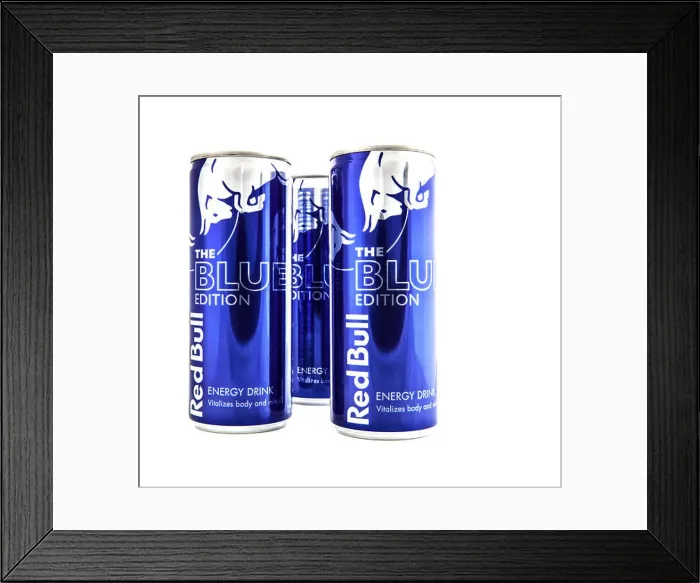 Framed Print : Red Bull Blue Edition energy drink on white background Framed Print : Red Bull Blue Edition energy drink on white background