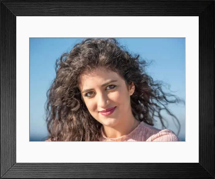 Framed Print : Beautiful young woman smiling outdoors Framed Print : Beautiful young woman smiling outdoors