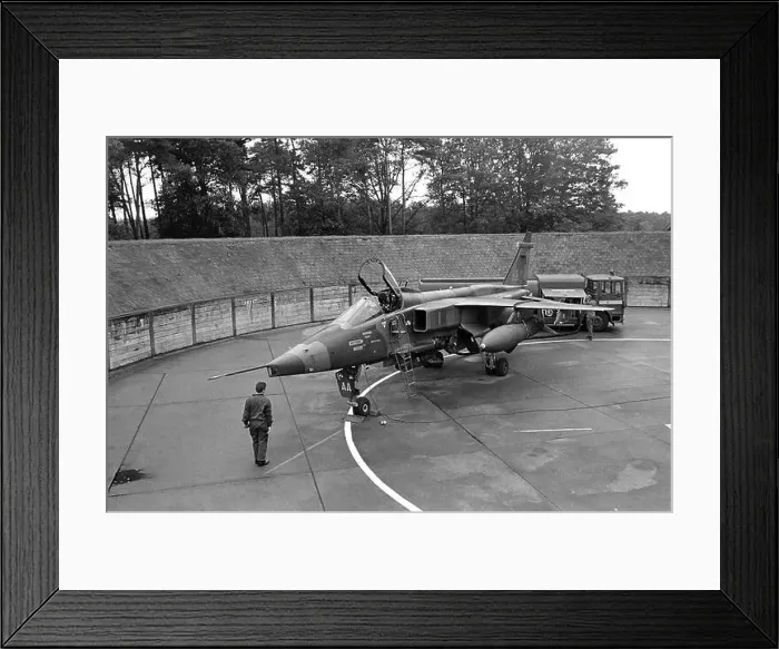 Framed Print : NATO in Germany, British SEPECAT Jaguar strike aircraft in its armored shelter at RAF Bruggen air base (September 1984) Framed Print : NATO in Germany, British SEPECAT Jaguar strike aircraft in its armored shelter at RAF Bruggen air base (September 1984)