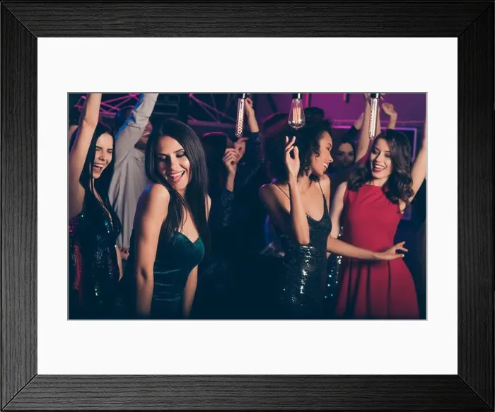Framed Print : Photo of young beautiful girls dancing on party in night club wearing classy stylish dresses smiling relaxing together Framed Print : Photo of young beautiful girls dancing on party in night club wearing classy stylish dresses smiling relaxing together