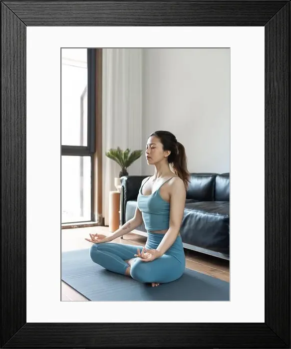 Framed Print : A young Asian woman doing yoga at home Framed Print : A young Asian woman doing yoga at home