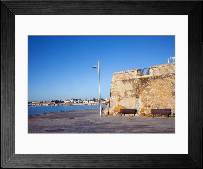 Framed Print : Promenade witch benches along the Atlantic Ocean coast on a sunny day in Cascais, Portugal Framed Print : Promenade witch benches along the Atlantic Ocean coast on a sunny day in Cascais, Portugal