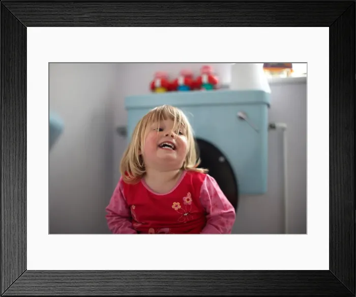 Framed Print : small girl on toilet Framed Print : small girl on toilet