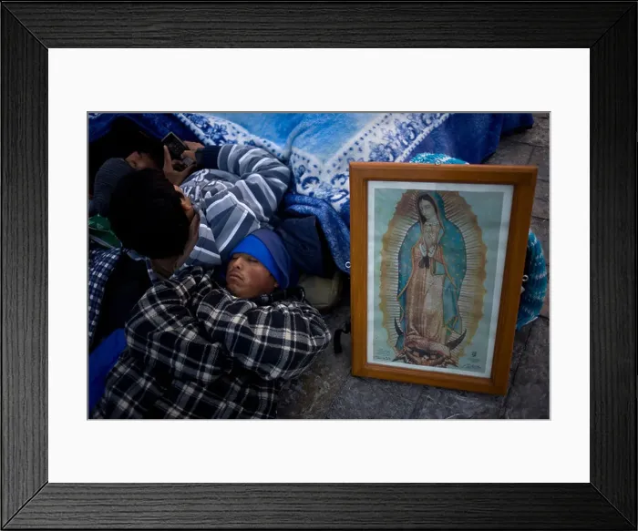 Framed Print : A pilgrim sleeps by an image of the Our Lady of Guadalupe virgin in Mexico City Framed Print : A pilgrim sleeps by an image of the Our Lady of Guadalupe virgin in Mexico City
