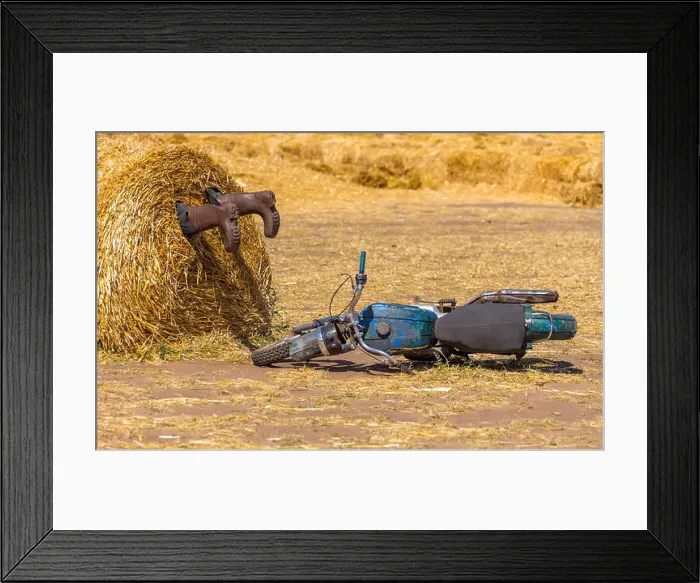 Framed Print : A motorycle near the haystack and boots in the pile of straw. crash humor concept decoration Framed Print : A motorycle near the haystack and boots in the pile of straw. crash humor concept decoration