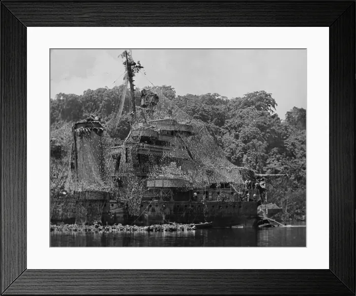 Framed Print : GUADALCANAL, SOLOMON ISLANDS - 1943 - The USS NEW ORLEANS heavily camouflaged with netting during the Battle of Framed Print : GUADALCANAL, SOLOMON ISLANDS - 1943 - The USS NEW ORLEANS heavily camouflaged with netting during the Battle of