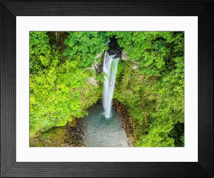 Framed Print : Drone view of water cascade in Katibawasan Falls. Camiguin Island. Philippines Framed Print : Drone view of water cascade in Katibawasan Falls. Camiguin Island. Philippines