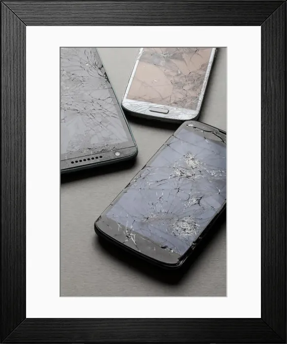 Framed Print : Smashed shattered broken screen of a mobile smartphone Framed Print : Smashed shattered broken screen of a mobile smartphone