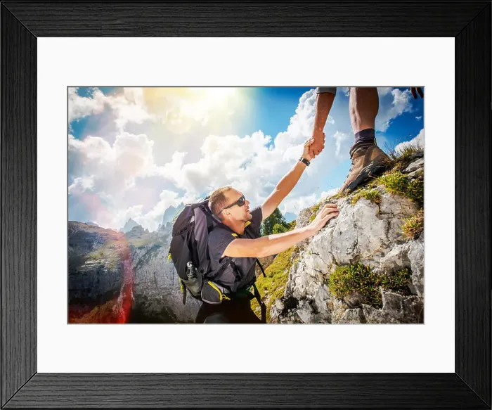 Framed Print : Friendly Hand on the High Mountain Hike. Men Helping Other Hiker by Giving Him Hand. Hiking Theme Framed Print : Friendly Hand on the High Mountain Hike. Men Helping Other Hiker by Giving Him Hand. Hiking Theme