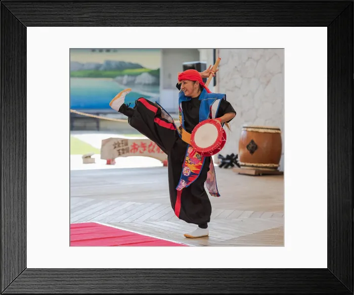 Framed Print : Okinawa / Japan - October 9, 2018: Eisa dancer steps up at Okinawa World folkloric dance performance Framed Print : Okinawa / Japan - October 9, 2018: Eisa dancer steps up at Okinawa World folkloric dance performance