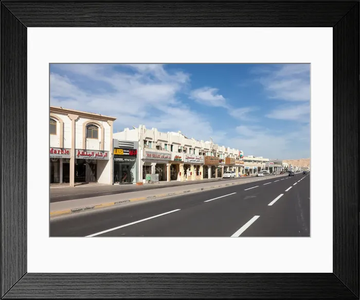 Framed Print : Row of shops in the city of Al Ain, UAE Framed Print : Row of shops in the city of Al Ain, UAE