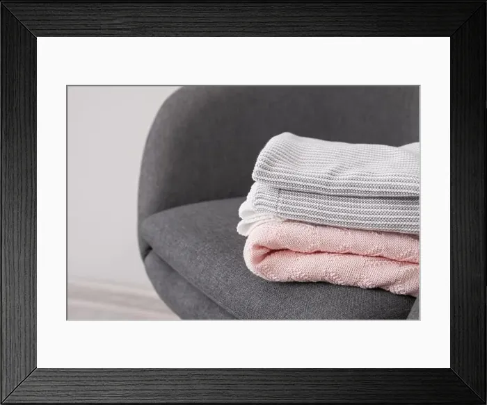 Framed Print : Armchair with warm plaids in room, closeup Framed Print : Armchair with warm plaids in room, closeup