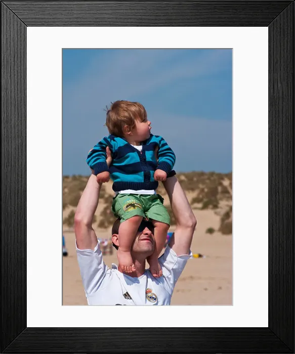 Framed Print : Father Holding Baby Son Above His Head Framed Print : Father Holding Baby Son Above His Head