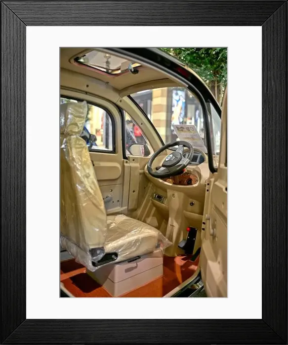 Framed Print : Electric car. Interior of single seater battery powered motor car. Thailand Asia Framed Print : Electric car. Interior of single seater battery powered motor car. Thailand Asia