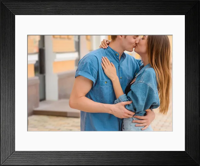 Framed Print : Sweet kiss from an adorable couple Framed Print : Sweet kiss from an adorable couple