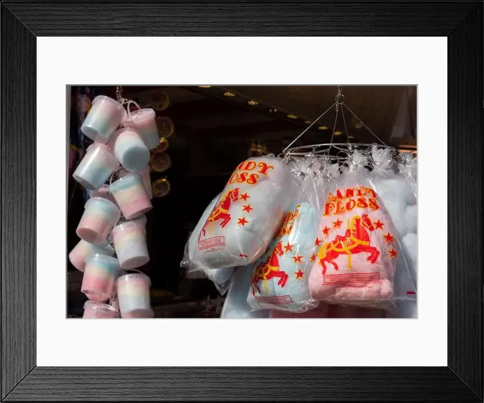 Framed Print : Bag and pots of candy floss hanging for sale at an English fun fair. April 2023 Framed Print : Bag and pots of candy floss hanging for sale at an English fun fair. April 2023