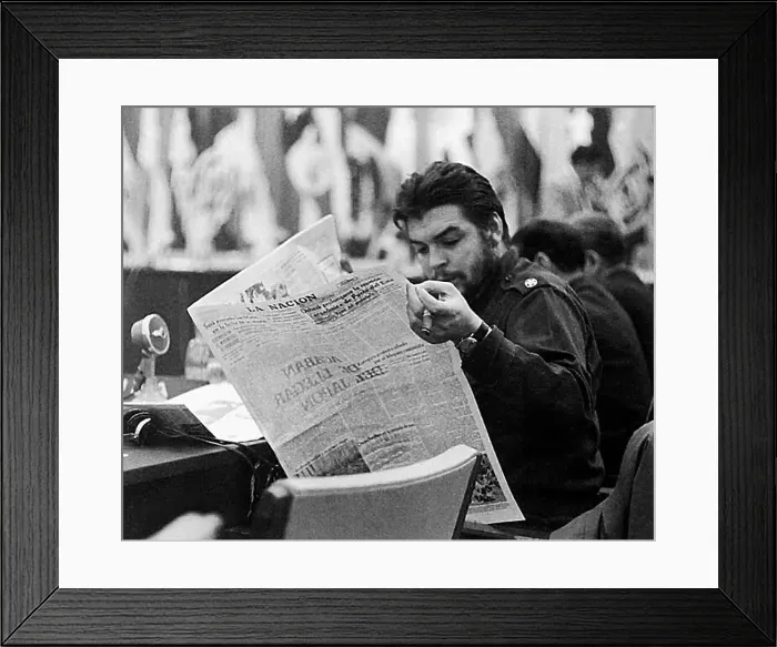 Framed Print : Ernesto Che Guevara reading La Nacion newspaper Framed Print : Ernesto Che Guevara reading La Nacion newspaper