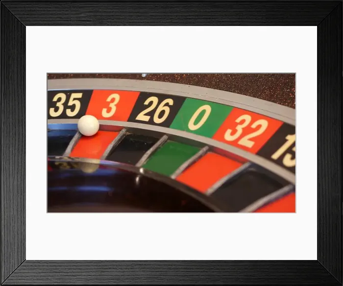 Framed Print : Ball on wooden french roulette table in casino Framed Print : Ball on wooden french roulette table in casino