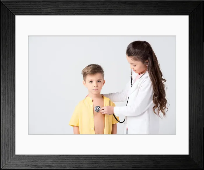 Framed Print : Cute little kids playing doctor and patient with stethoscope Framed Print : Cute little kids playing doctor and patient with stethoscope