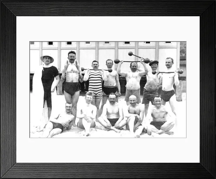 Framed Print : Men's group on the beach with weights, ca. 1929, 1920s, exact place unknown, Germany Framed Print : Men's group on the beach with weights, ca. 1929, 1920s, exact place unknown, Germany