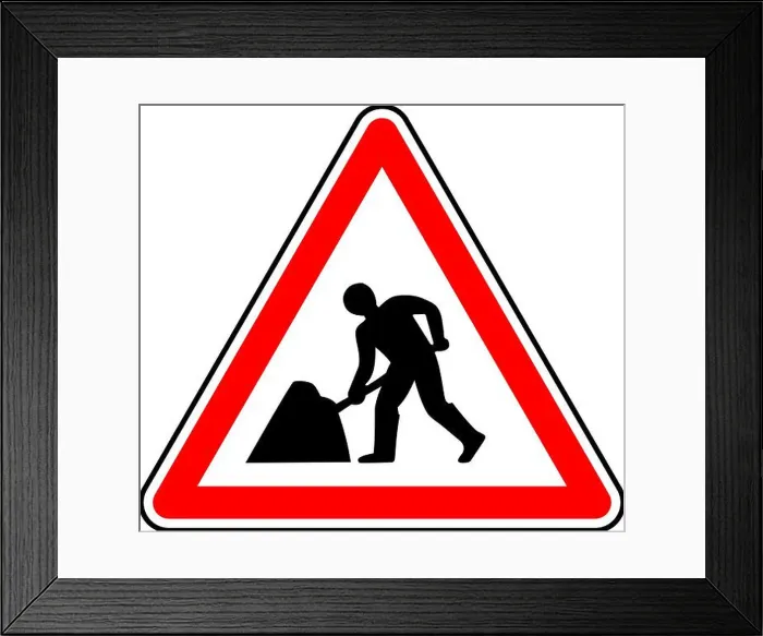 Framed Print : Vector graphic of a uk road works ahead road sign. It consists of a man digging symbol contained within a red triangle Framed Print : Vector graphic of a uk road works ahead road sign. It consists of a man digging symbol contained within a red triangle