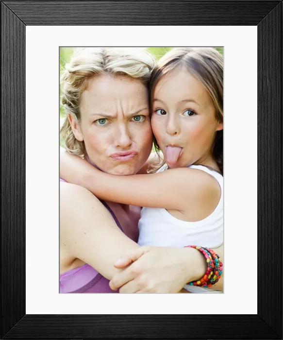 Framed Print : mother and daughter making faces
