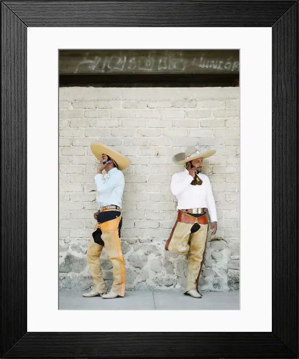 Framed Print : The Calling - Mexican cowboys talk on cell phones outside the bullring in Ajijic, Jalisco, Mexico Framed Print : The Calling - Mexican cowboys talk on cell phones outside the bullring in Ajijic, Jalisco, Mexico
