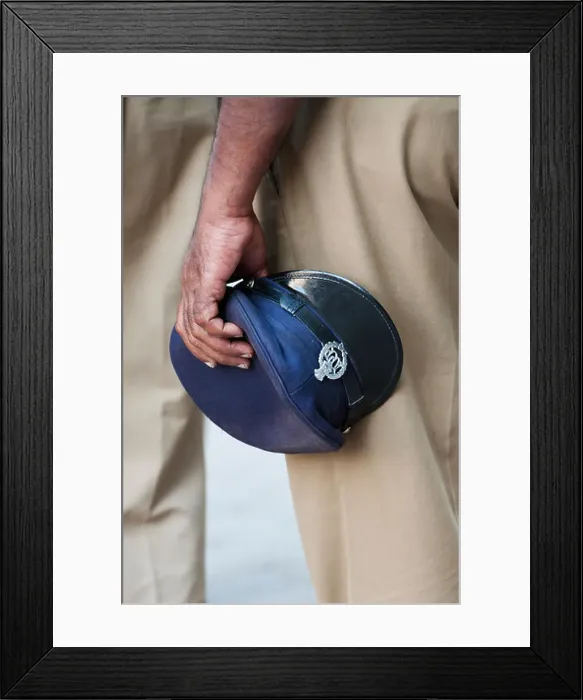 Framed Print : Indian policemans hat in hand. Andhra Pradesh, India Framed Print : Indian policemans hat in hand. Andhra Pradesh, India