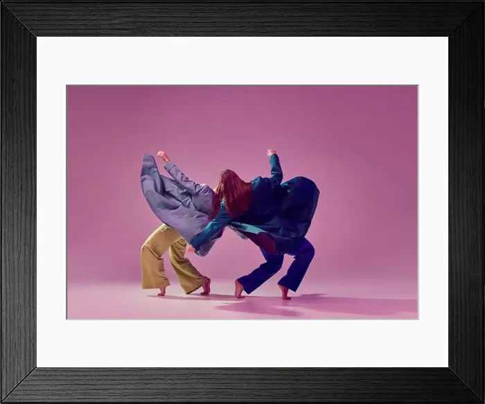 Framed Print : Contemporary dance couple in motion and action isolated on crystal pink background Framed Print : Contemporary dance couple in motion and action isolated on crystal pink background
