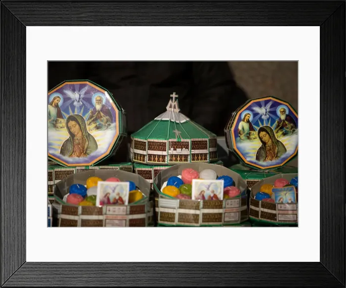 Framed Print : Candles and souvenirs of Our Lady of Guadalupe sit for sale in Mexico City Framed Print : Candles and souvenirs of Our Lady of Guadalupe sit for sale in Mexico City