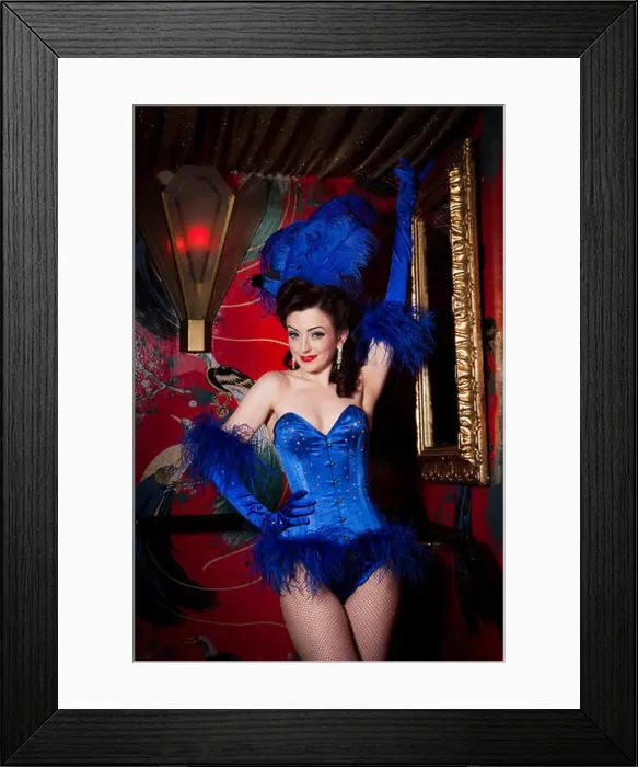 Framed Print : Burlesque performer Polly Rae at Madame Jojos, wearing blue feather head dress and blue corset, London Framed Print : Burlesque performer Polly Rae at Madame Jojos, wearing blue feather head dress and blue corset, London
