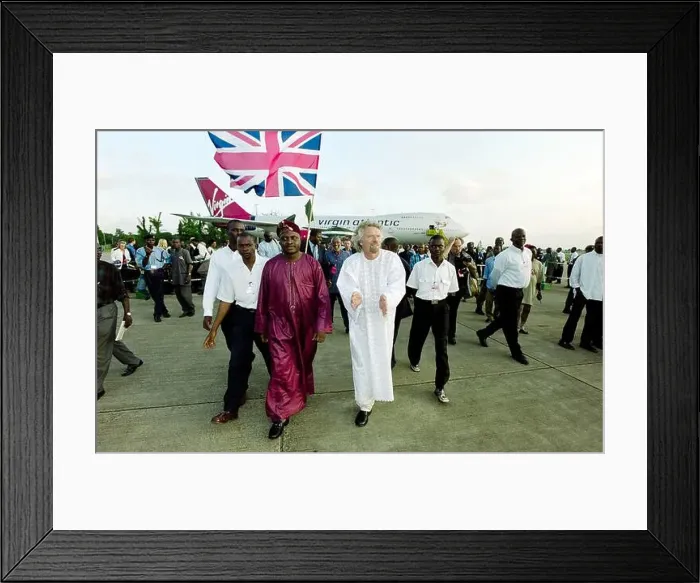 Framed Print : Virgin airlines boss Sir Richard Branson arriving at Lagos Airport in Nigeria on their inaugural flight in 1999 Framed Print : Virgin airlines boss Sir Richard Branson arriving at Lagos Airport in Nigeria on their inaugural flight in 1999