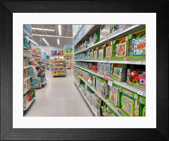 Framed Print : Toronto, On, Canada - November 27, 2024: View the shelves with the toys in the Toys R Us store Framed Print : Toronto, On, Canada - November 27, 2024: View the shelves with the toys in the Toys R Us store