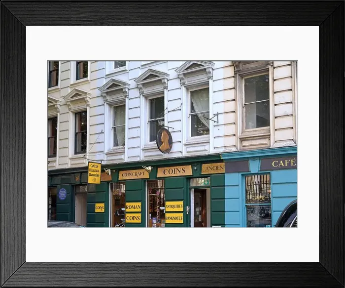 Framed Print : London, UK - Sept. 20, 2024: Coin shop in the Bloomsbury district of London Framed Print : London, UK - Sept. 20, 2024: Coin shop in the Bloomsbury district of London