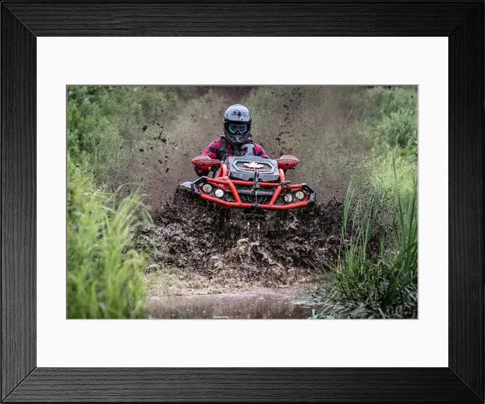 Framed Print : Man on Can-Am Outlander ATV Quad stuck in deep mud Framed Print : Man on Can-Am Outlander ATV Quad stuck in deep mud