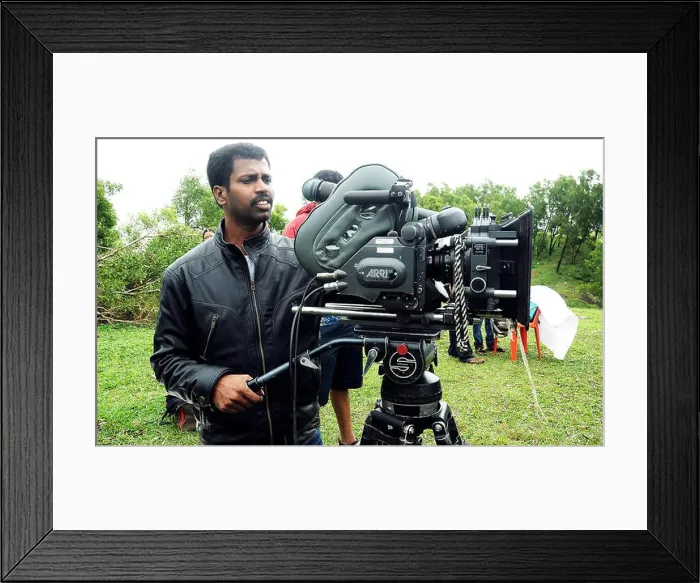 Framed Print : Cameraman at work, film shooting spot