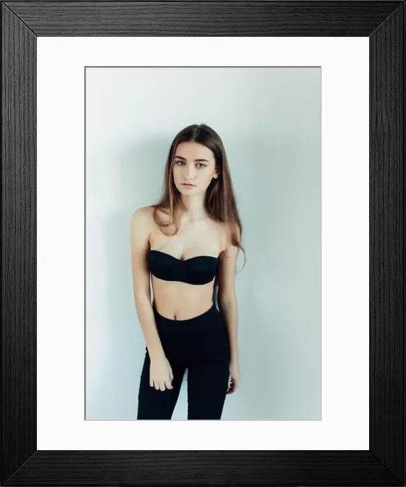 Framed Print : young girl in a black dress Framed Print : young girl in a black dress