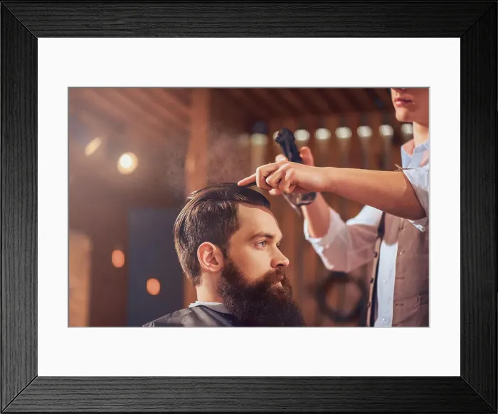 Framed Print : Professional barber styling hair of his client Framed Print : Professional barber styling hair of his client
