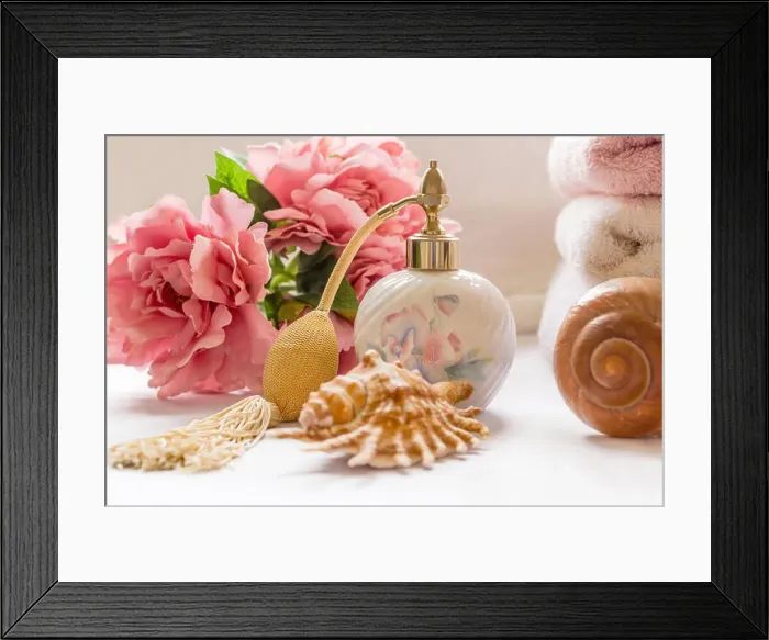 Framed Print : Bath arrangement with perfume bottle and pretty flowers Framed Print : Bath arrangement with perfume bottle and pretty flowers