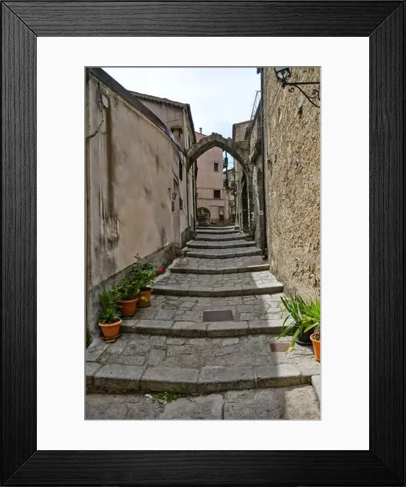 Framed Print : A street in the historic center of San Giovanni in Fiore, a medieval town in the Cosenza province Framed Print : A street in the historic center of San Giovanni in Fiore, a medieval town in the Cosenza province