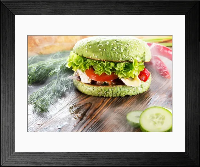Framed Print : burger with green bun in light smoke on wooden background Framed Print : burger with green bun in light smoke on wooden background