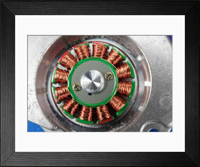 Framed Print : Brushless DC motor stator disassembled from computer drive Framed Print : Brushless DC motor stator disassembled from computer drive
