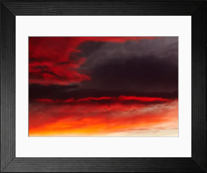 Framed Print : Winter sunset with red clouds