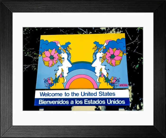 Framed Print : A U.S. government sign illustrated by American artist Peter Max welcomes visitors Framed Print : A U.S. government sign illustrated by American artist Peter Max welcomes visitors