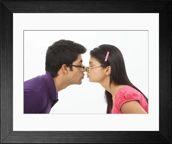Framed Print : Young couple romancing Framed Print : Young couple romancing