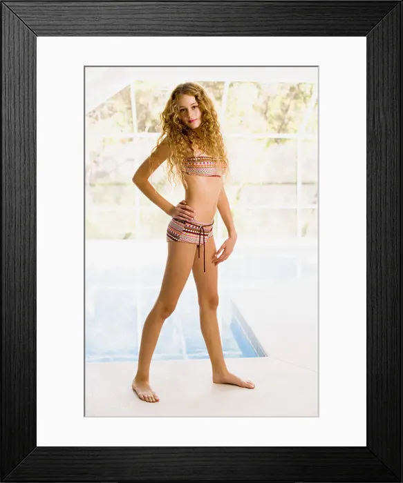 Framed Print : Young woman model doing modeling shoot for portfolio